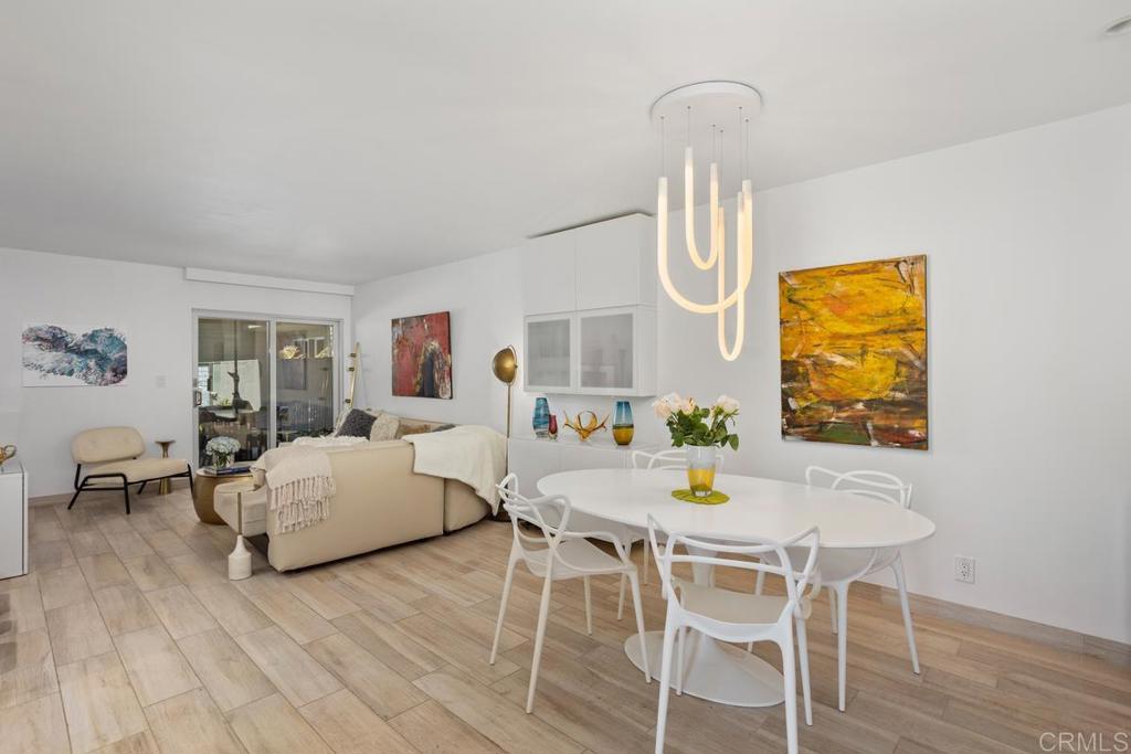 940 Sealane Drive, Unit 3 Encinitas, CA 92024 - Photo 8 of 29 a living room with fireplace furniture and a wooden floor