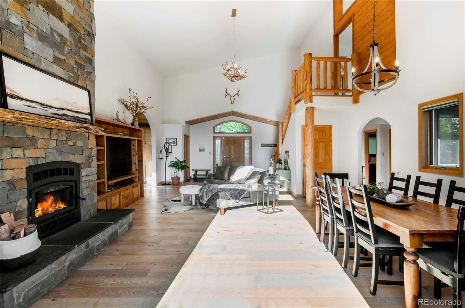 13416 Kuehster Road Littleton, CO 80127 - Photo 12 of 50 a living room with fireplace furniture and a fireplace