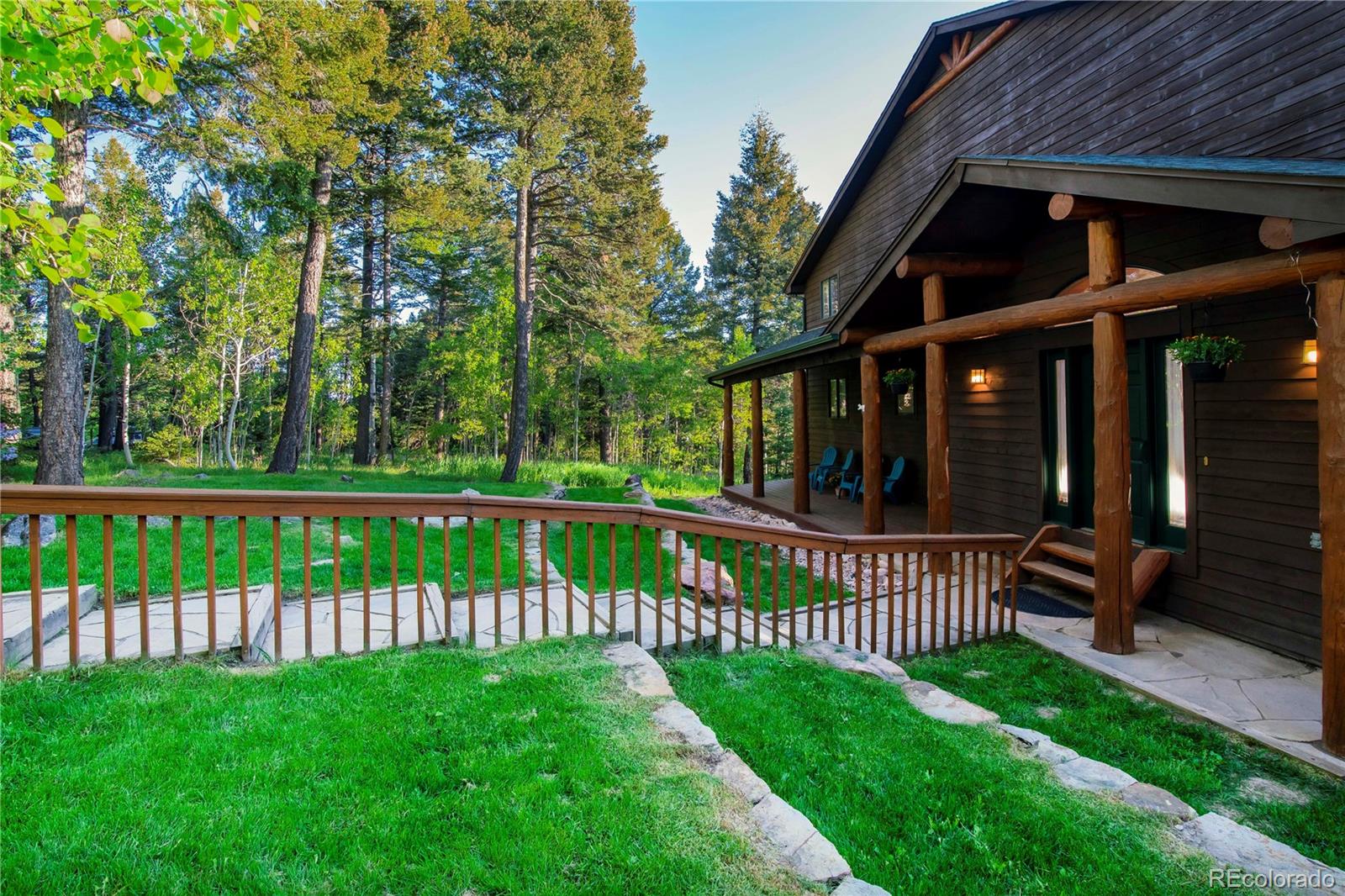 13416 Kuehster Road Littleton, CO 80127 - Photo 6 of 50 a view of a deck with a yard
