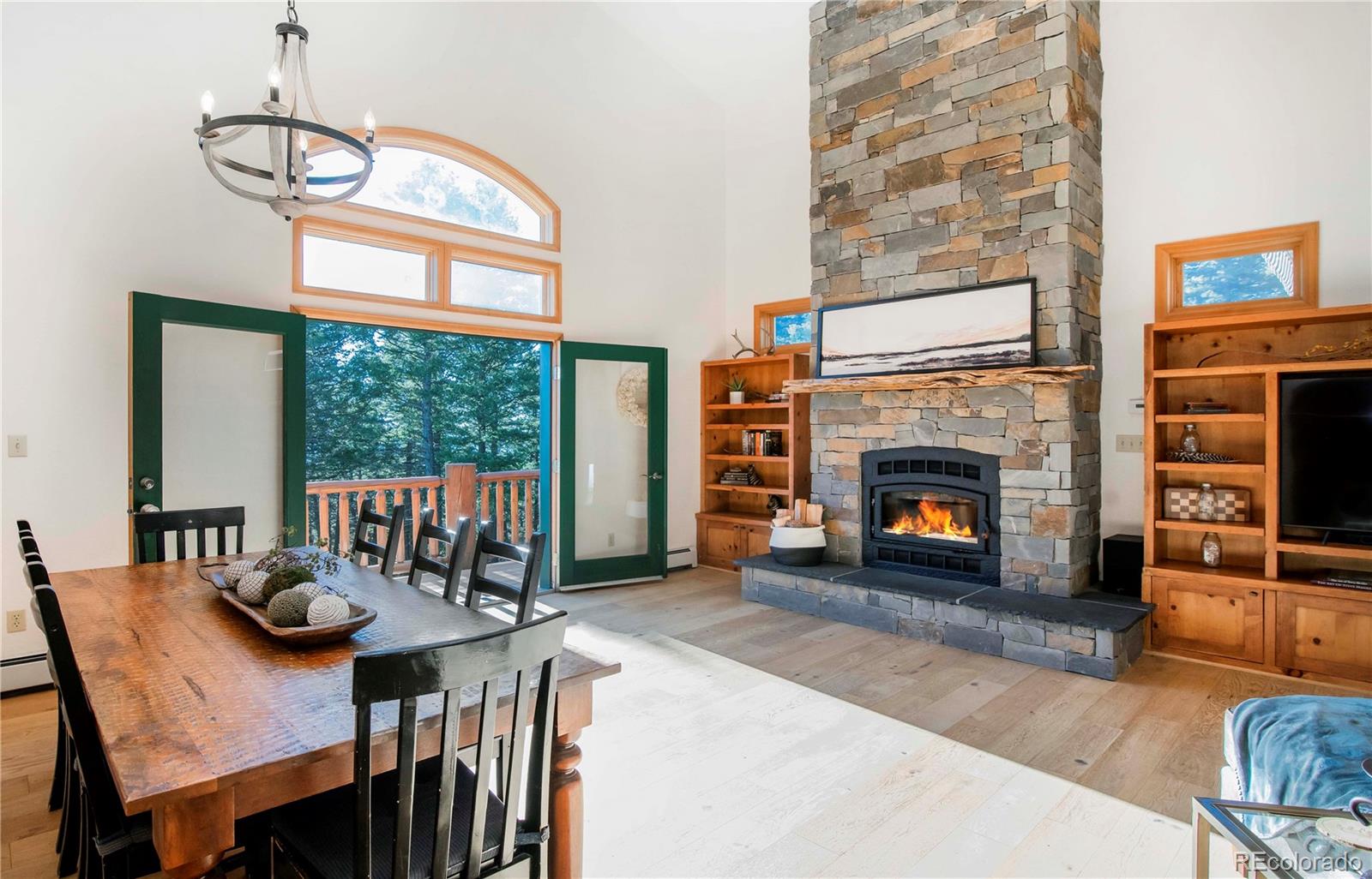 13416 Kuehster Road Littleton, CO 80127 - Photo 10 of 50 a view of a livingroom with furniture window and fireplace