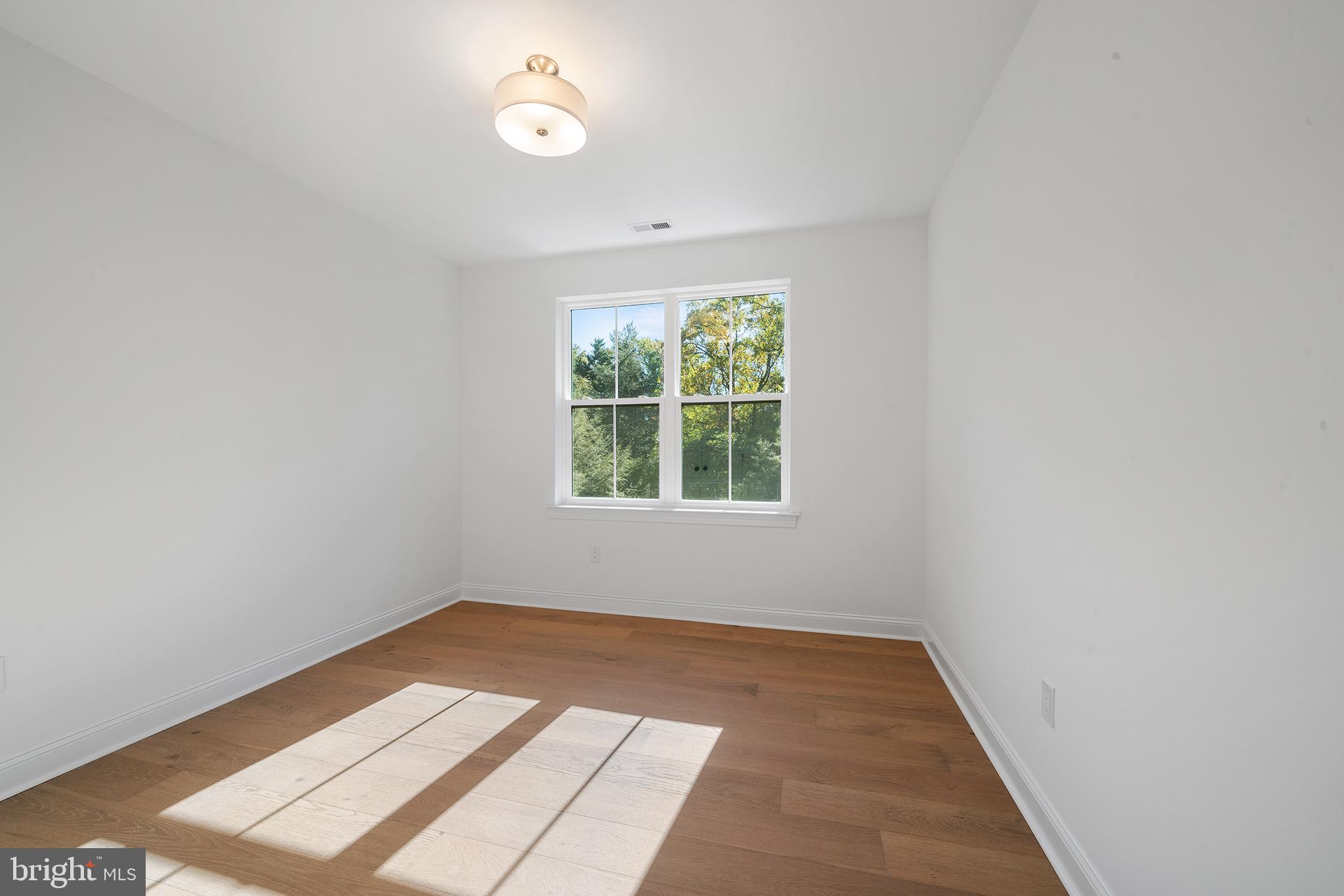 2261 Valley Road Huntingdon Valley, PA 19006 - Photo 13 of 17 an empty room with window