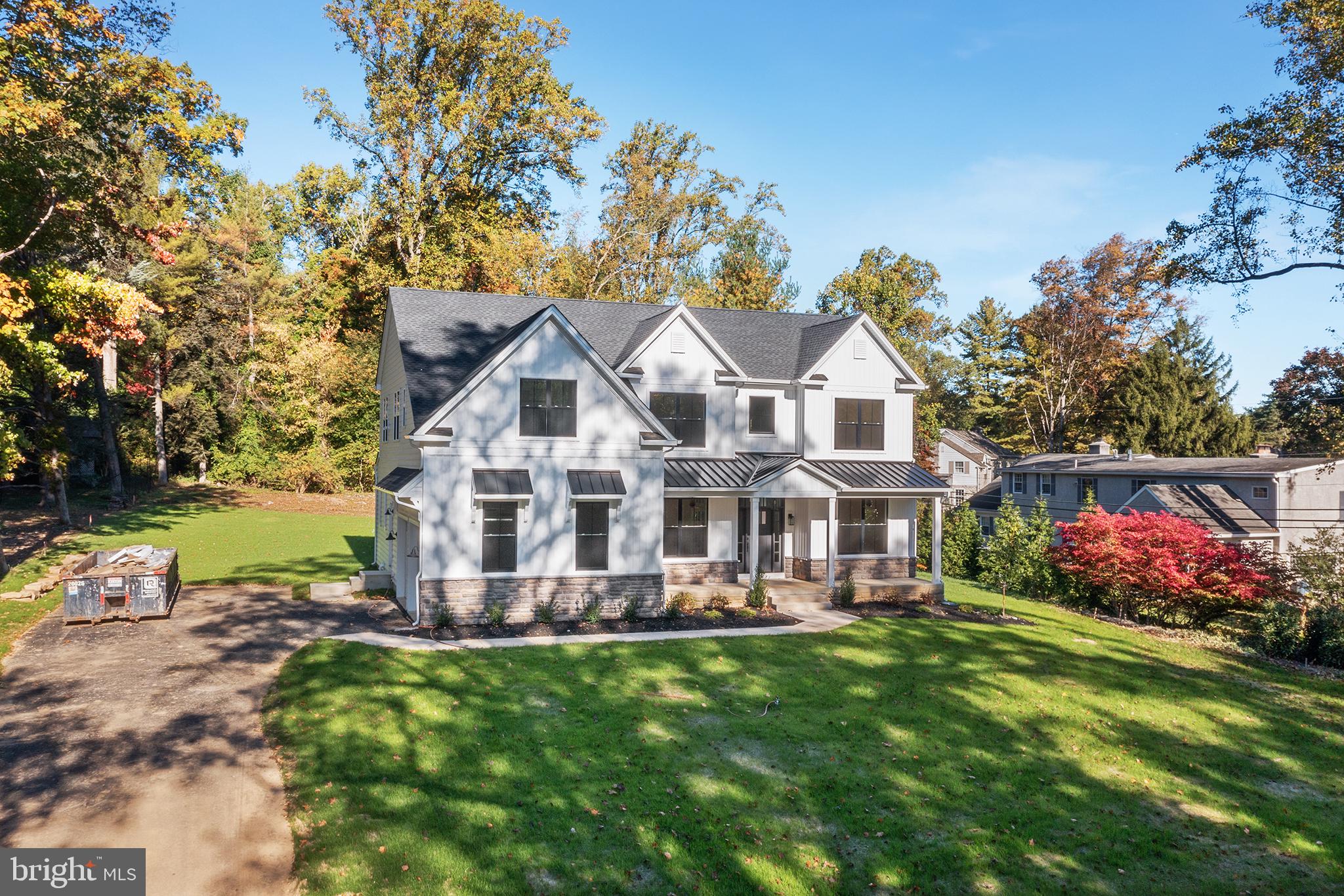 2261 Valley Road Huntingdon Valley, PA 19006 - Photo 2 of 17 a view of a house with a big yard and large trees