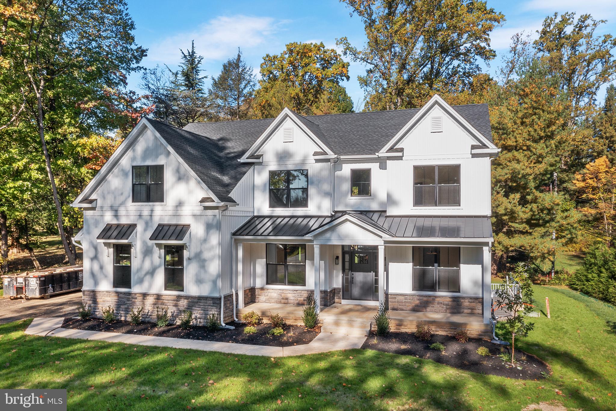 2261 Valley Road Huntingdon Valley, PA 19006 - Photo 3 of 17 a front view of a house with a yard