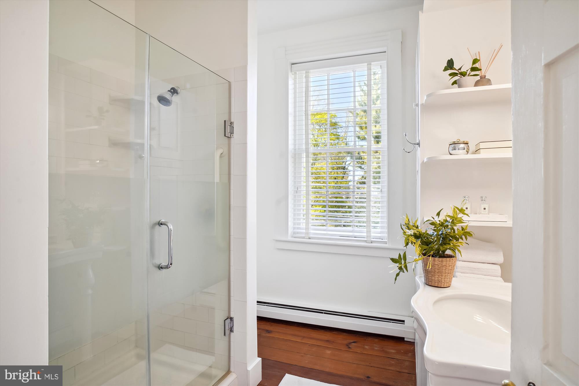 7000 Brink Road Laytonsville, MD 20882 - Photo 36 of 58 The renovated full bath has lots of storage.