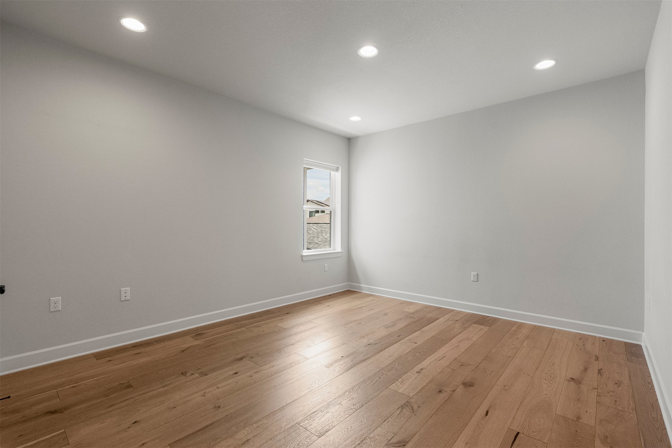 4313 Vaughan Street Austin, TX 78723 - Photo 30 of 39 A second oversized bedroom upstairs provides plenty of space to spread out, making it ideal for family or guests