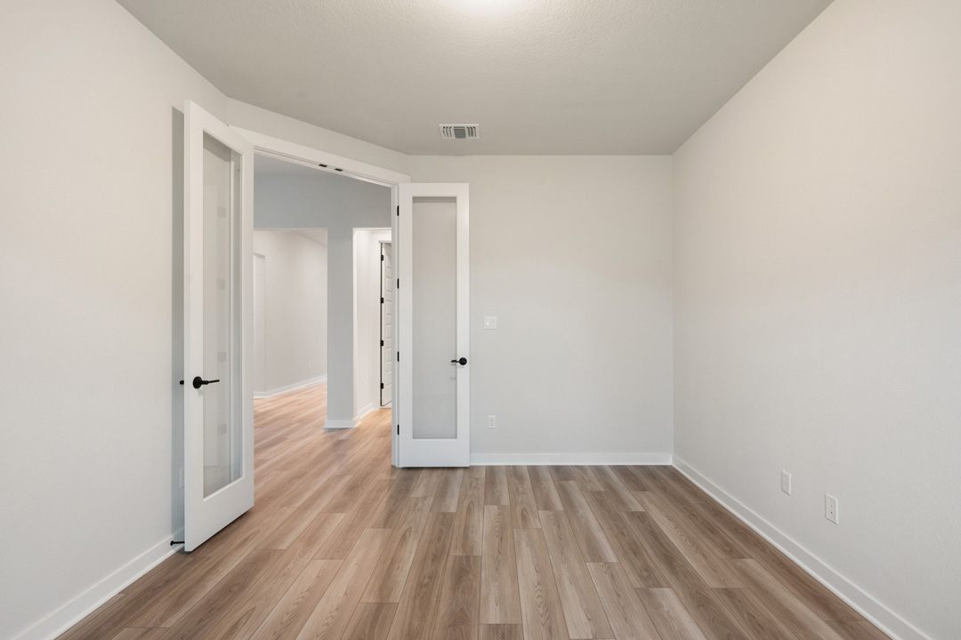 16201 Smithers Road Manor, TX 78653 - Photo 7 of 40 a view of a room with wooden floor