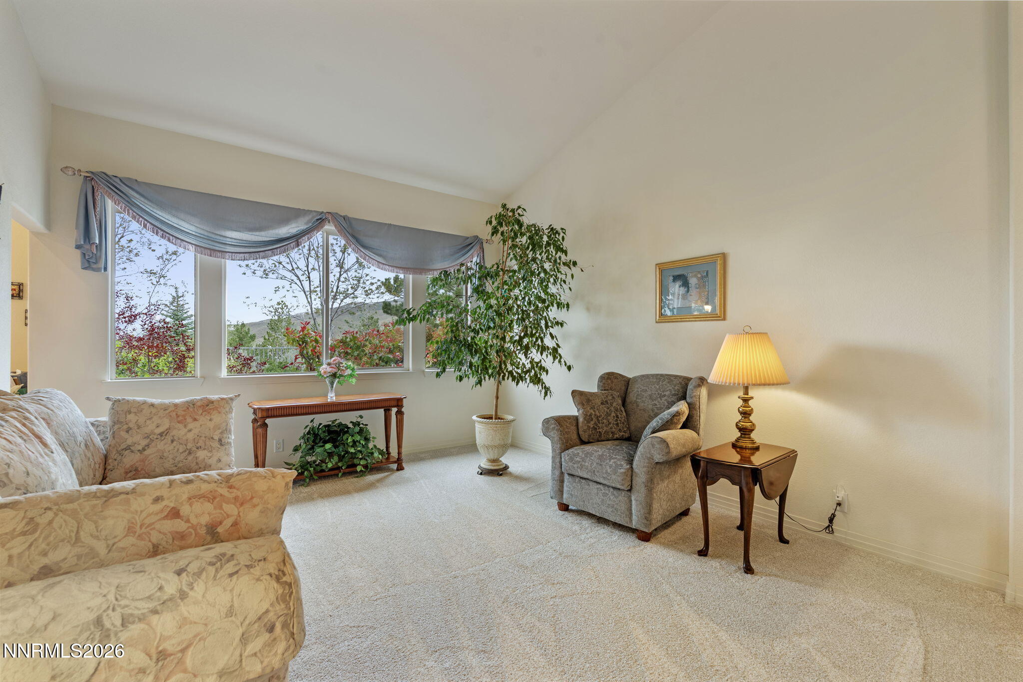 2741 Sunline Drive Reno, NV 89523 - Photo 13 of 47 a living room with furniture and a fireplace