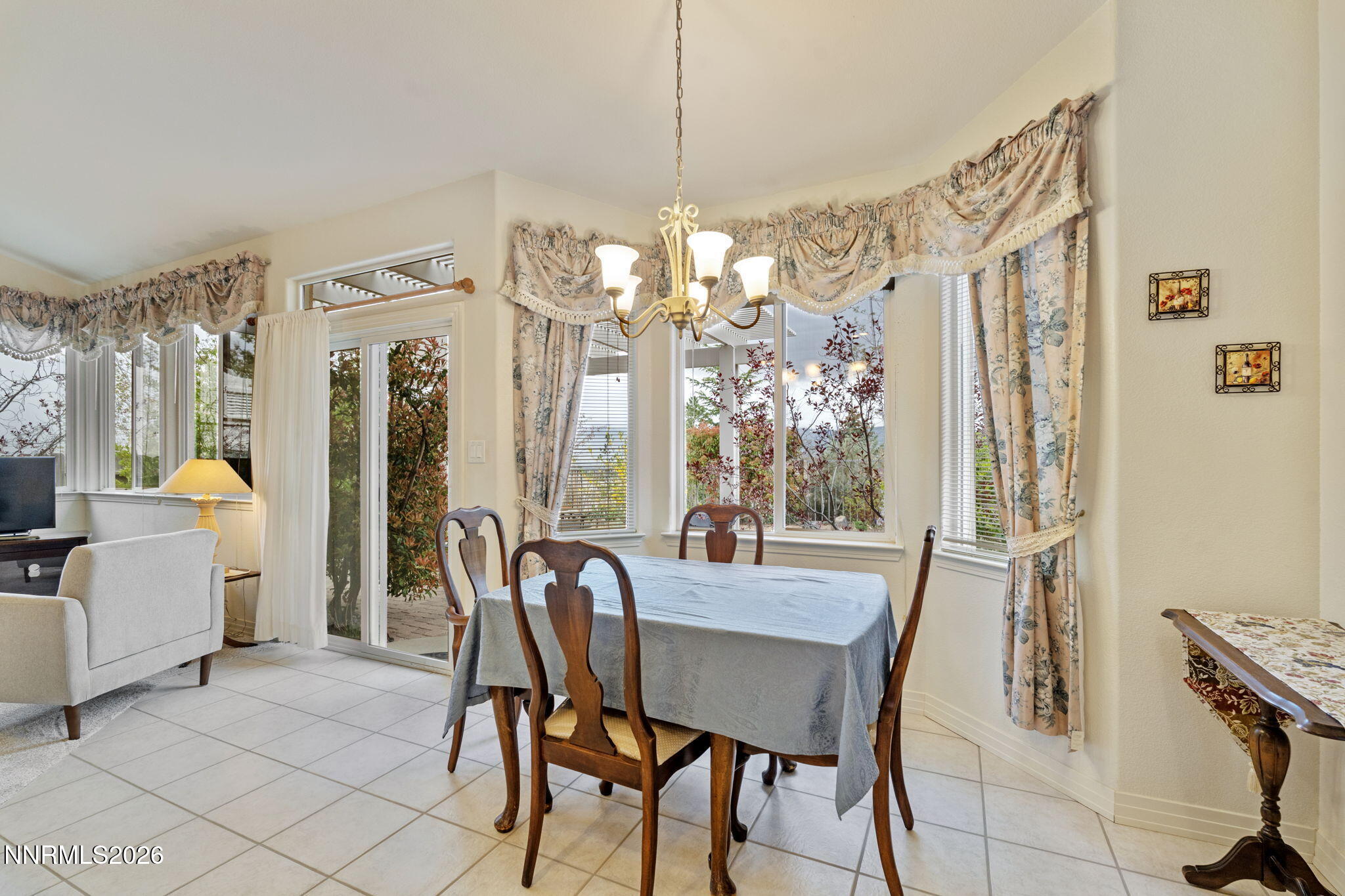 2741 Sunline Drive Reno, NV 89523 - Photo 18 of 47 a view of a dining room with furniture window and outside view