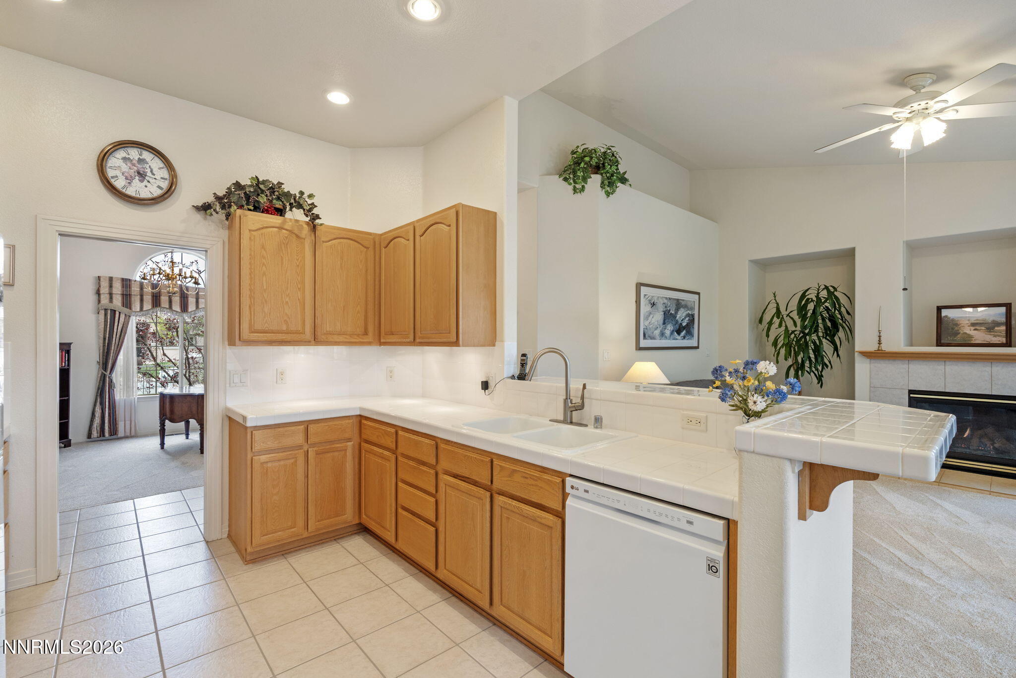 2741 Sunline Drive Reno, NV 89523 - Photo 23 of 47 a kitchen with a sink and cabinets