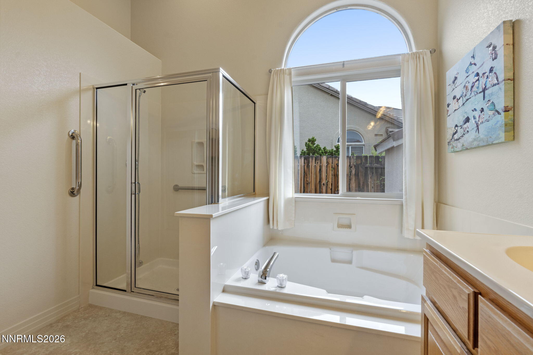 2741 Sunline Drive Reno, NV 89523 - Photo 33 of 47 a bathroom with a bathtub and a shower