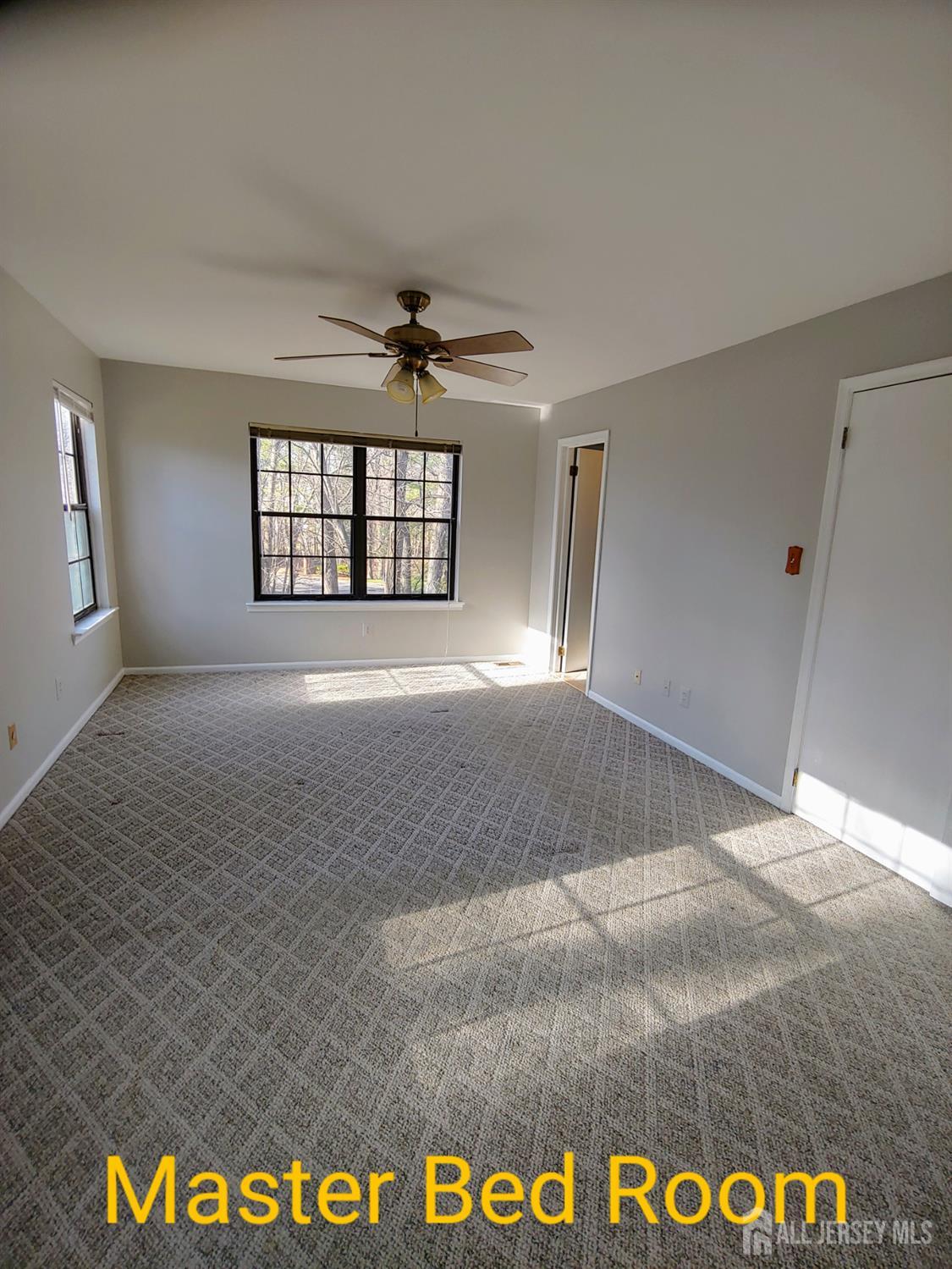 3305 Stonehedge Road Edison, NJ 08820 - Photo 15 of 16 a view of an empty room and window