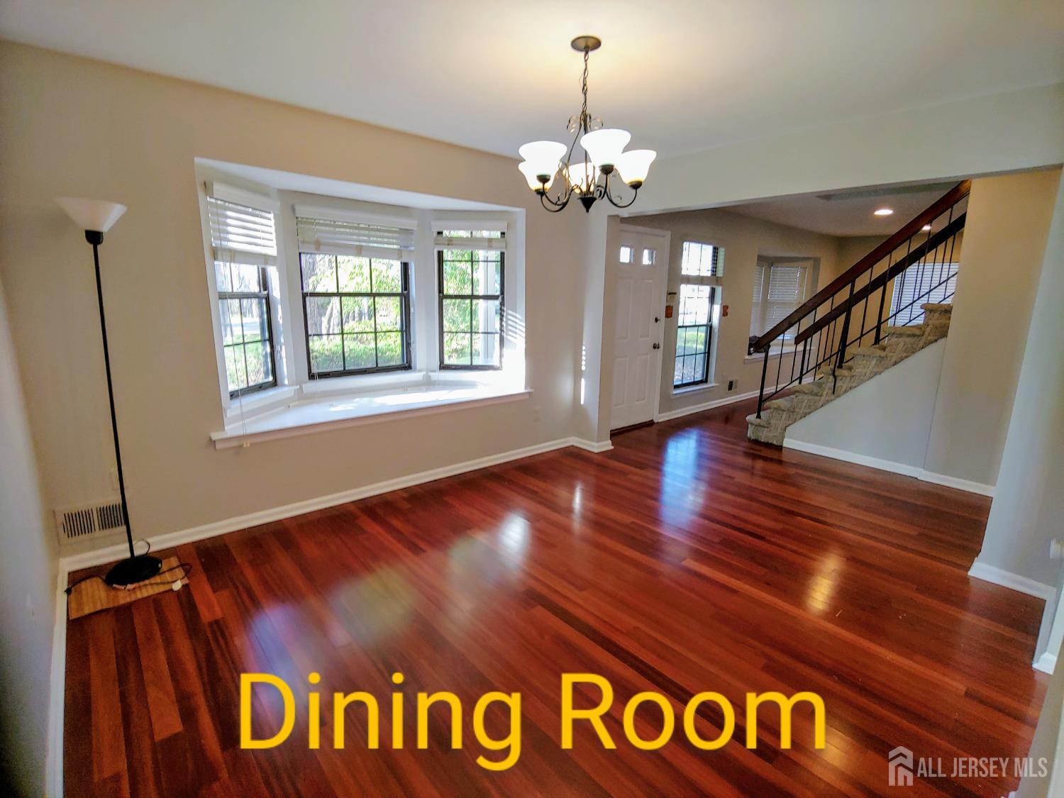 3305 Stonehedge Road Edison, NJ 08820 - Photo 5 of 16 a view of an entryway with wooden floor