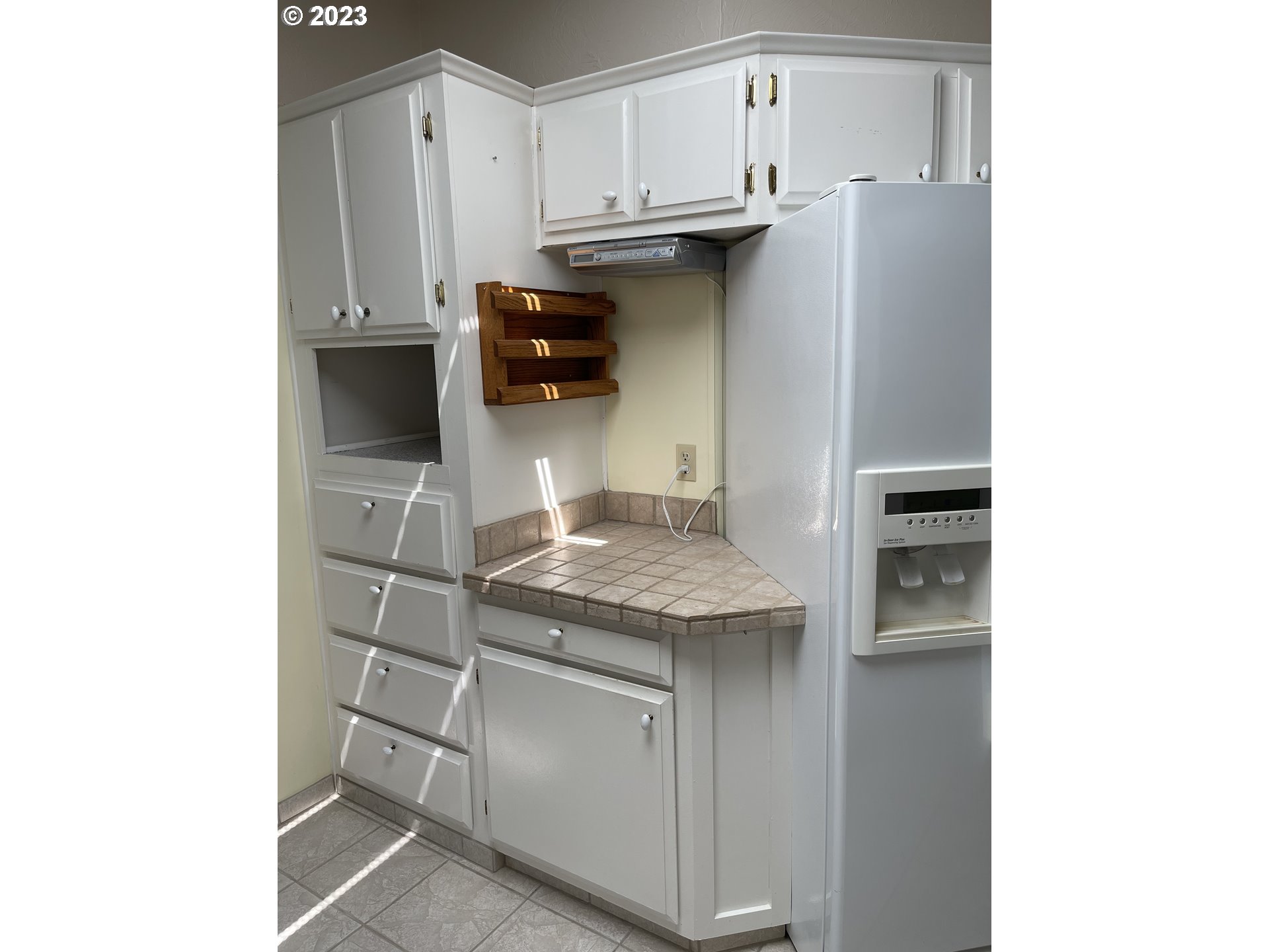 100 River Bend Road, Unit 121 Reedsport, OR 97467 - Photo 11 of 22 a kitchen with stainless steel appliances granite countertop a sink and cabinets