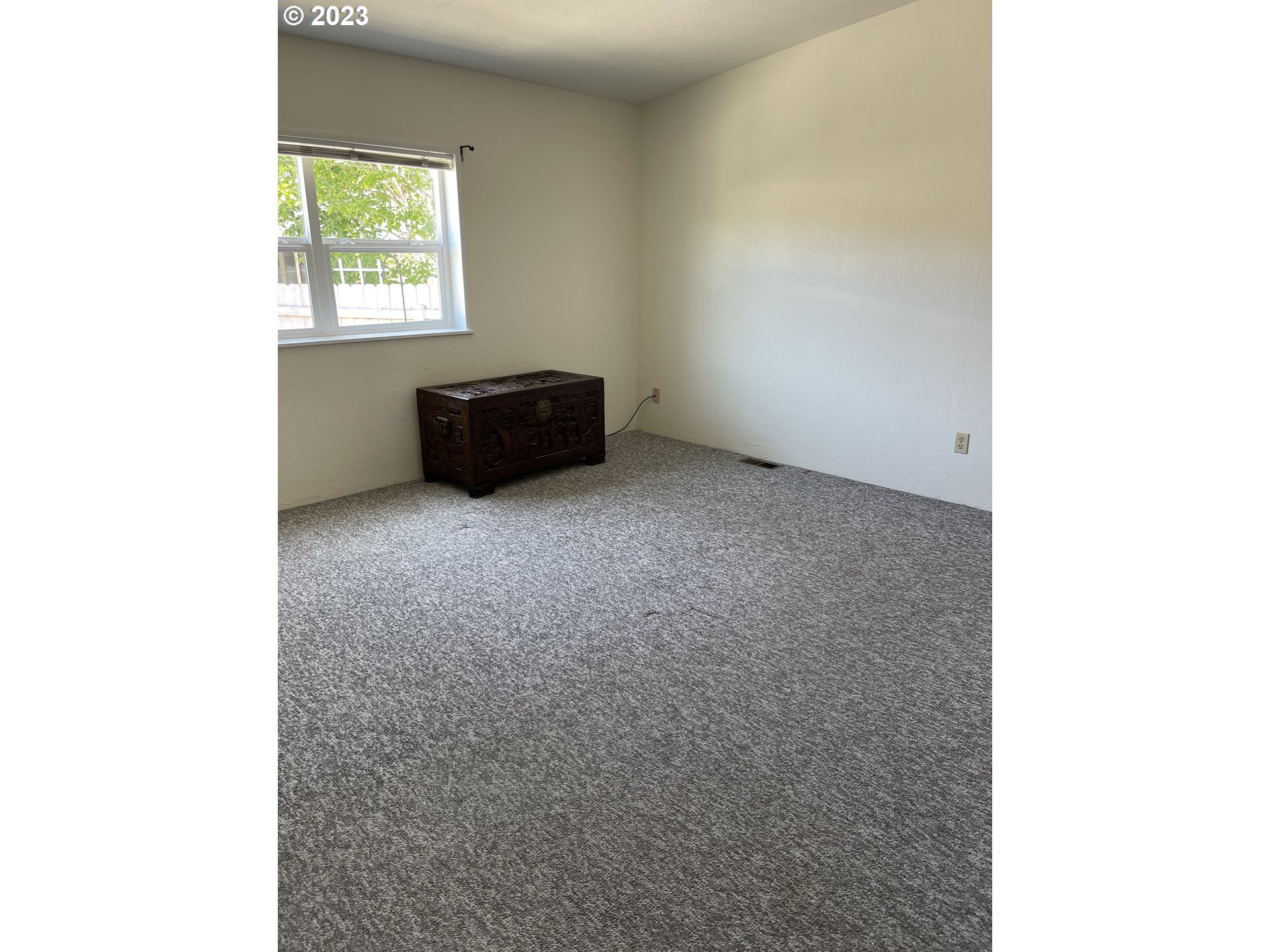 100 River Bend Road, Unit 121 Reedsport, OR 97467 - Photo 16 of 22 a view of an empty room with a window