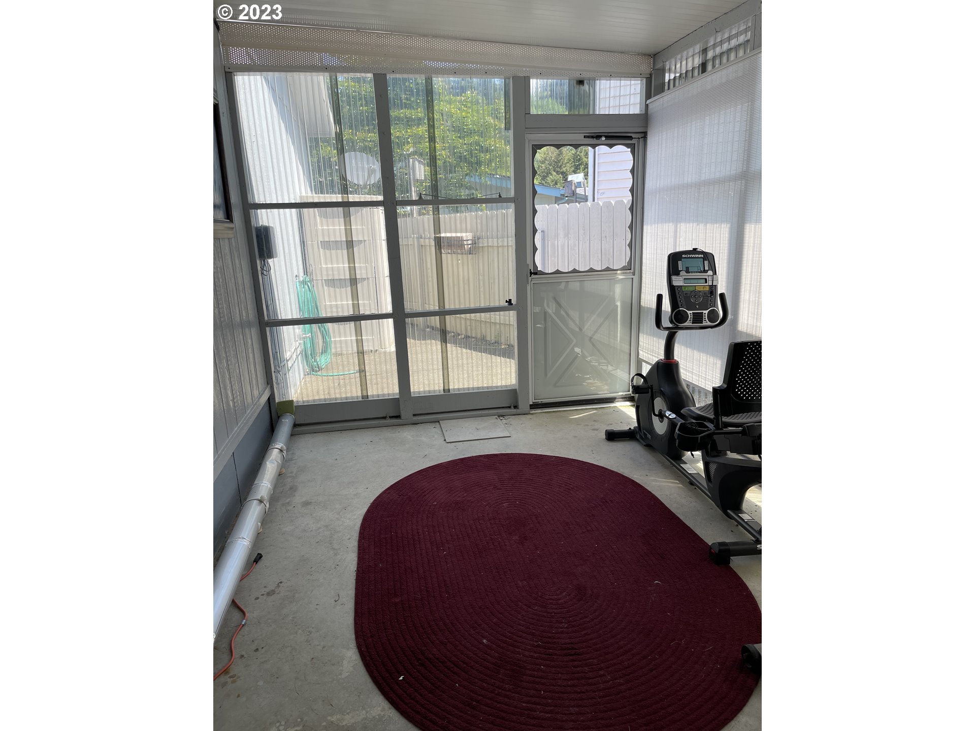 100 River Bend Road, Unit 121 Reedsport, OR 97467 - Photo 21 of 22 a view of a room with gym equipment
