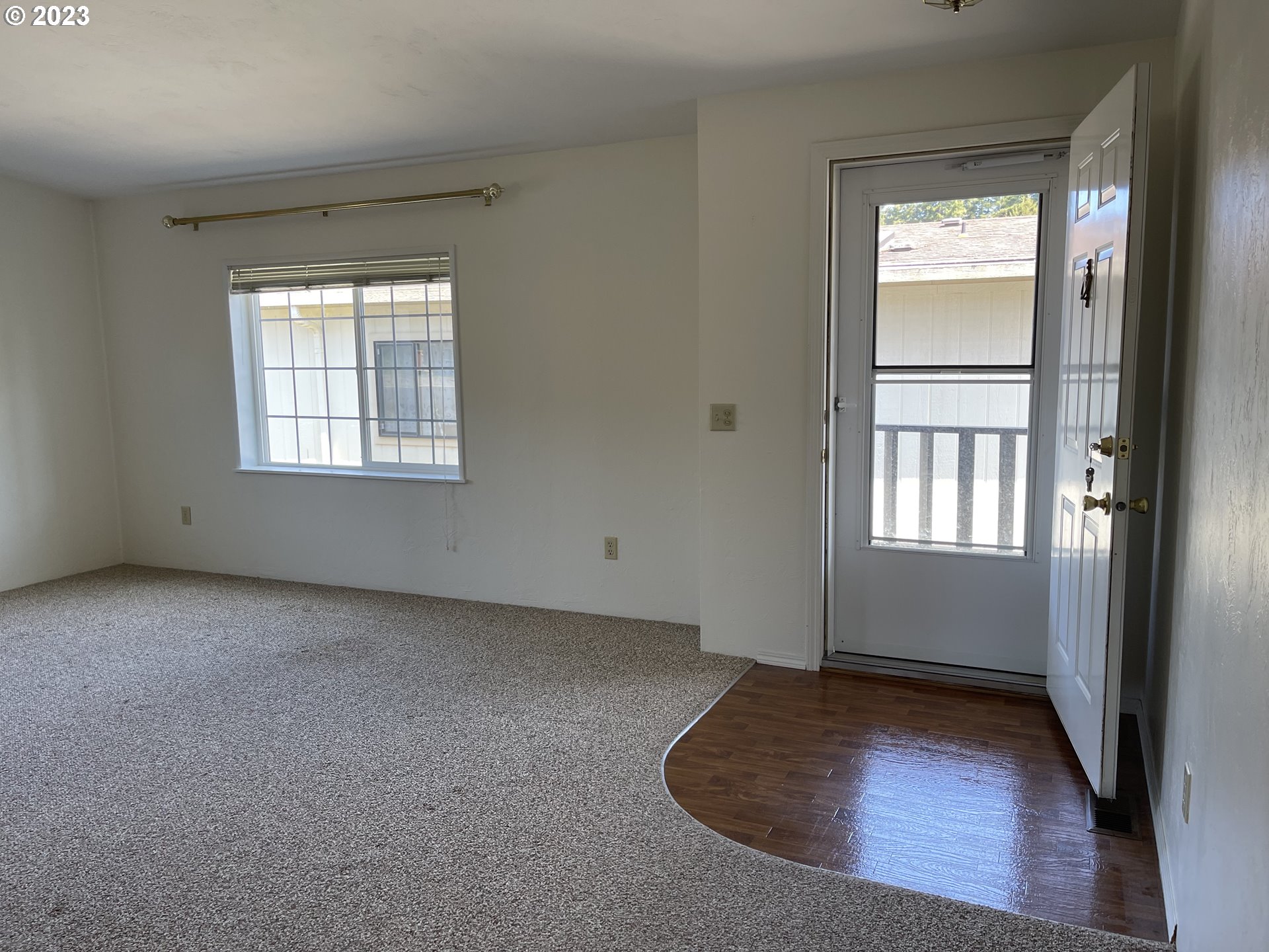 100 River Bend Road, Unit 121 Reedsport, OR 97467 - Photo 3 of 22 an empty room with windows