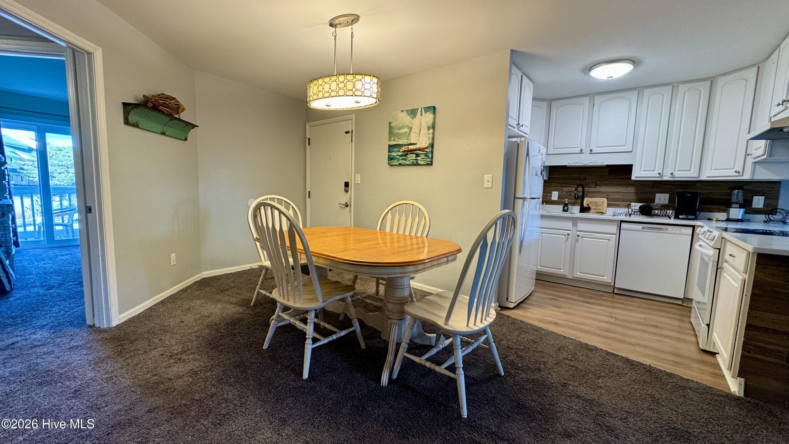 9201 Coast Guard Road, Unit E101 Emerald Isle, NC 28594 - Photo 17 of 50 dining