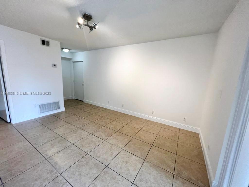 5612 Rock Island Road, Unit 141 Tamarac, FL 33319 - Photo 8 of 22 a view of an empty room