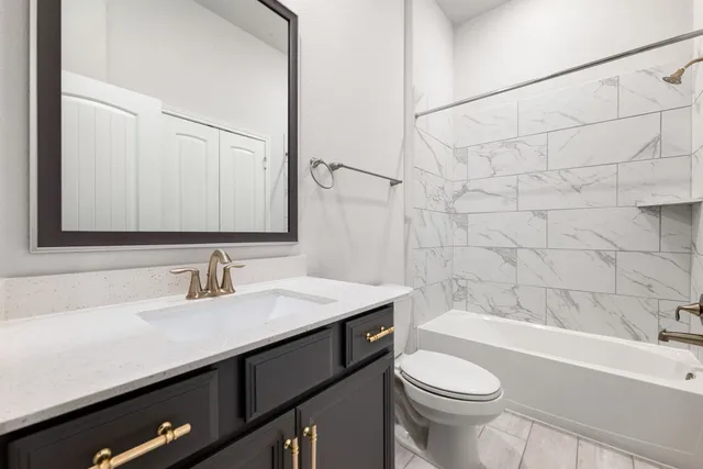 a living room with furniture a window and flowerpot