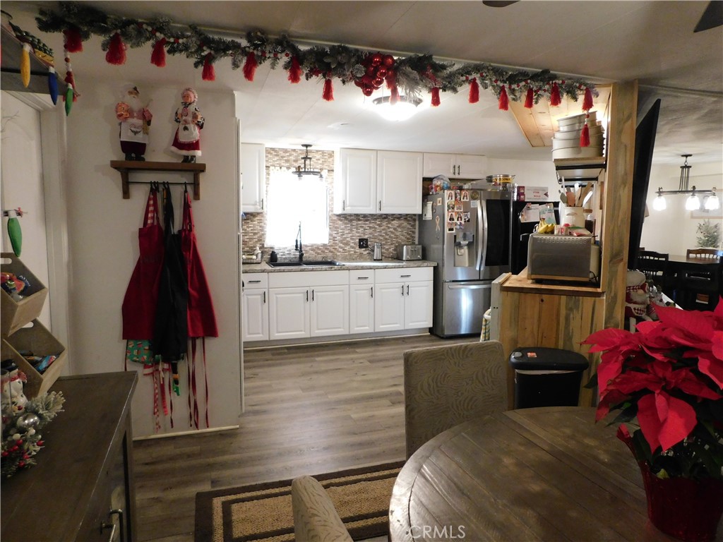 10350 Baseline, Unit 55 Alta Loma, CA 91701 - Photo 14 of 53 a living room with furniture and a flat screen tv