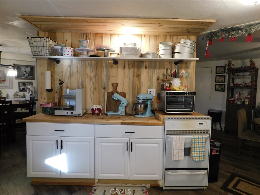 10350 Baseline, Unit 55 Alta Loma, CA 91701 - Photo 21 of 53 a kitchen with white cabinets and window