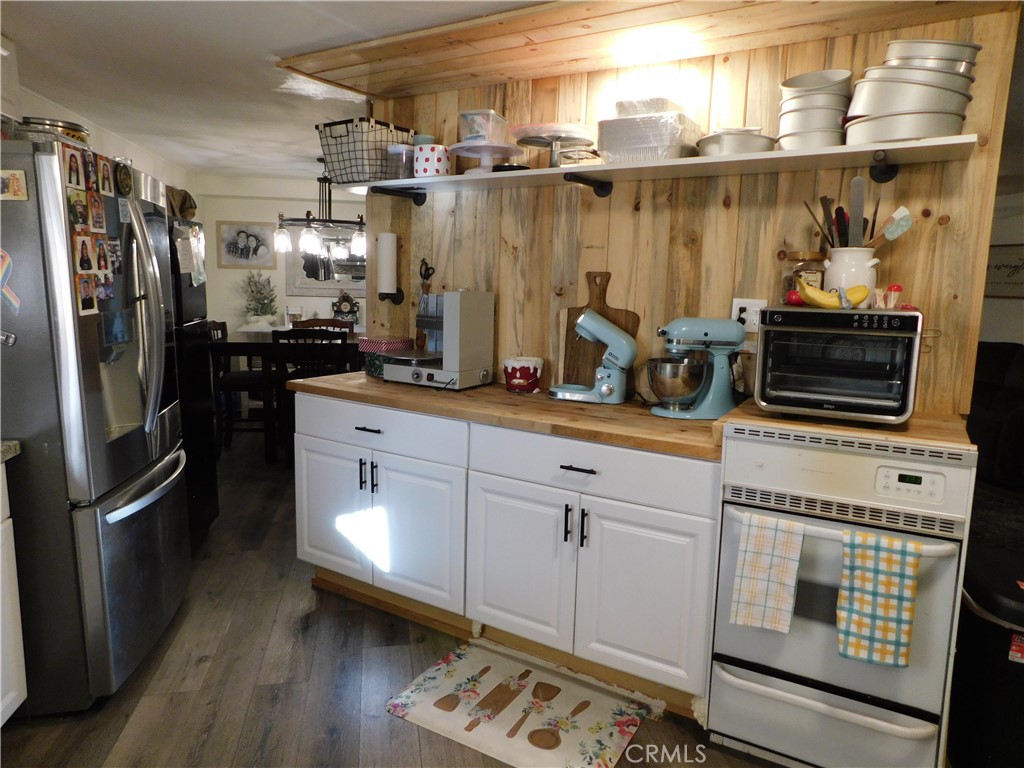 10350 Baseline, Unit 55 Alta Loma, CA 91701 - Photo 22 of 53 a kitchen with appliances and cabinets