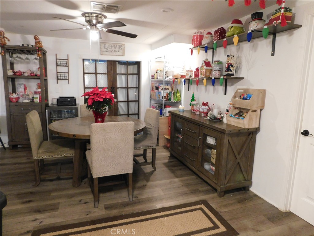 10350 Baseline, Unit 55 Alta Loma, CA 91701 - Photo 24 of 53 a view of a dining room with furniture and a chandelier