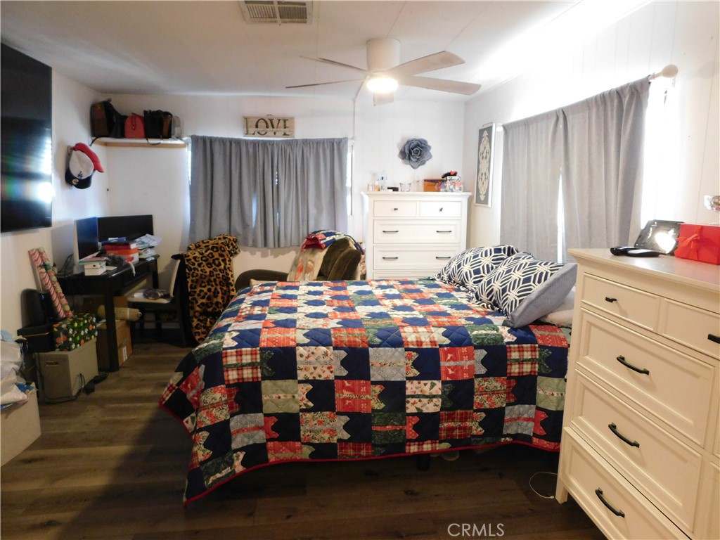 10350 Baseline, Unit 55 Alta Loma, CA 91701 - Photo 27 of 53 a bed room with a bed and a window