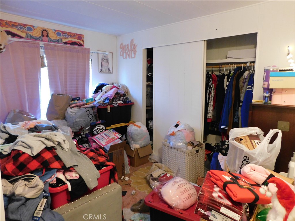10350 Baseline, Unit 55 Alta Loma, CA 91701 - Photo 37 of 53 a living room with furniture and a closet
