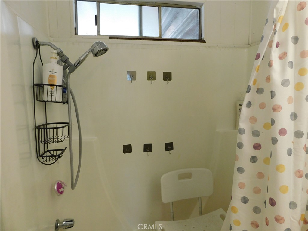 10350 Baseline, Unit 55 Alta Loma, CA 91701 - Photo 39 of 53 a bathroom with a shower
