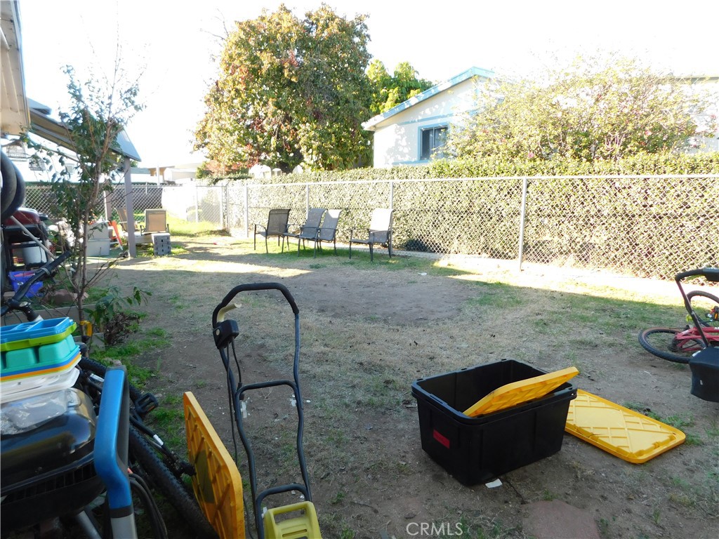 10350 Baseline, Unit 55 Alta Loma, CA 91701 - Photo 47 of 53 a backyard of a house with table and chairs
