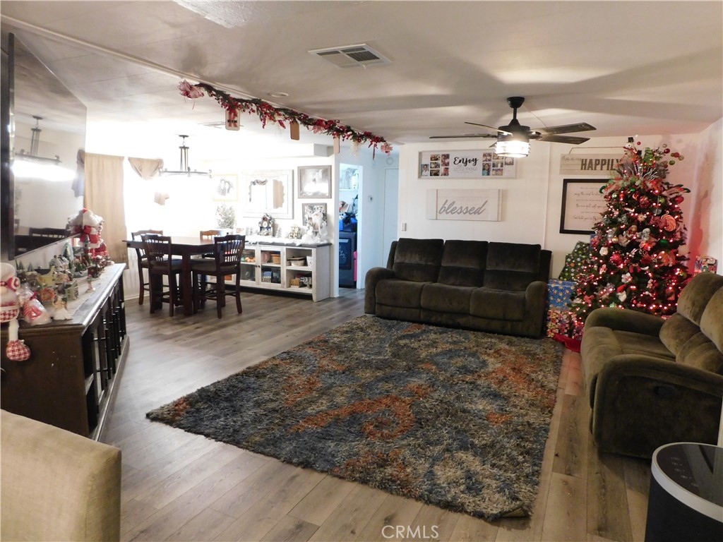 10350 Baseline, Unit 55 Alta Loma, CA 91701 - Photo 5 of 53 a living room with lots of furniture and a flat screen tv