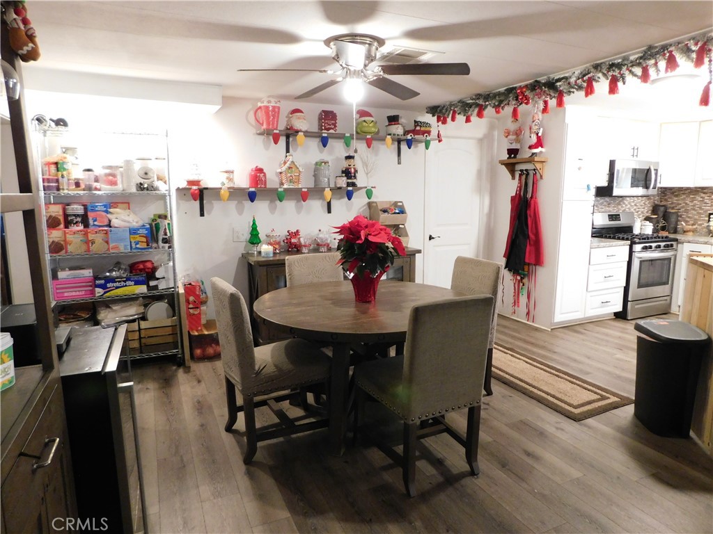 10350 Baseline, Unit 55 Alta Loma, CA 91701 - Photo 8 of 53 a view of a dining room with furniture and wooden floor