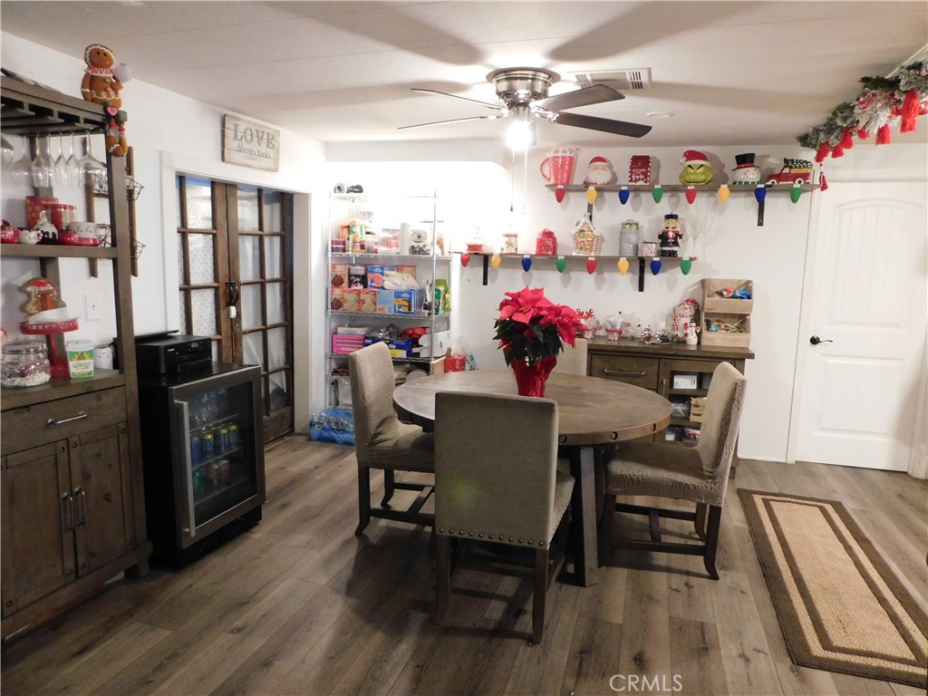 10350 Baseline, Unit 55 Alta Loma, CA 91701 - Photo 9 of 53 a view of a dining room with furniture window and wooden floor