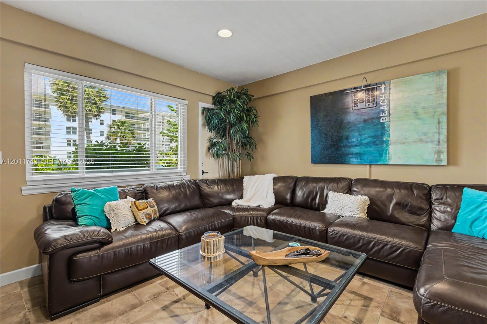 1801 South Surf Road, Unit 2G Hollywood, FL 33019 - Photo 13 of 32 a living room with furniture and a large window