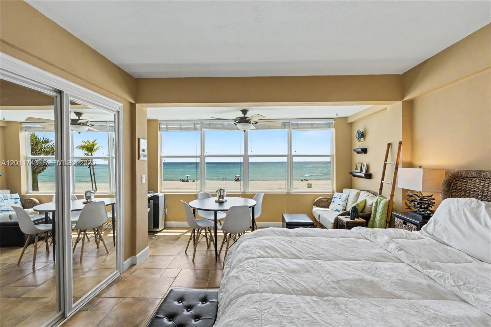 1801 South Surf Road, Unit 2G Hollywood, FL 33019 - Photo 24 of 32 a bed room with a bed and a large window