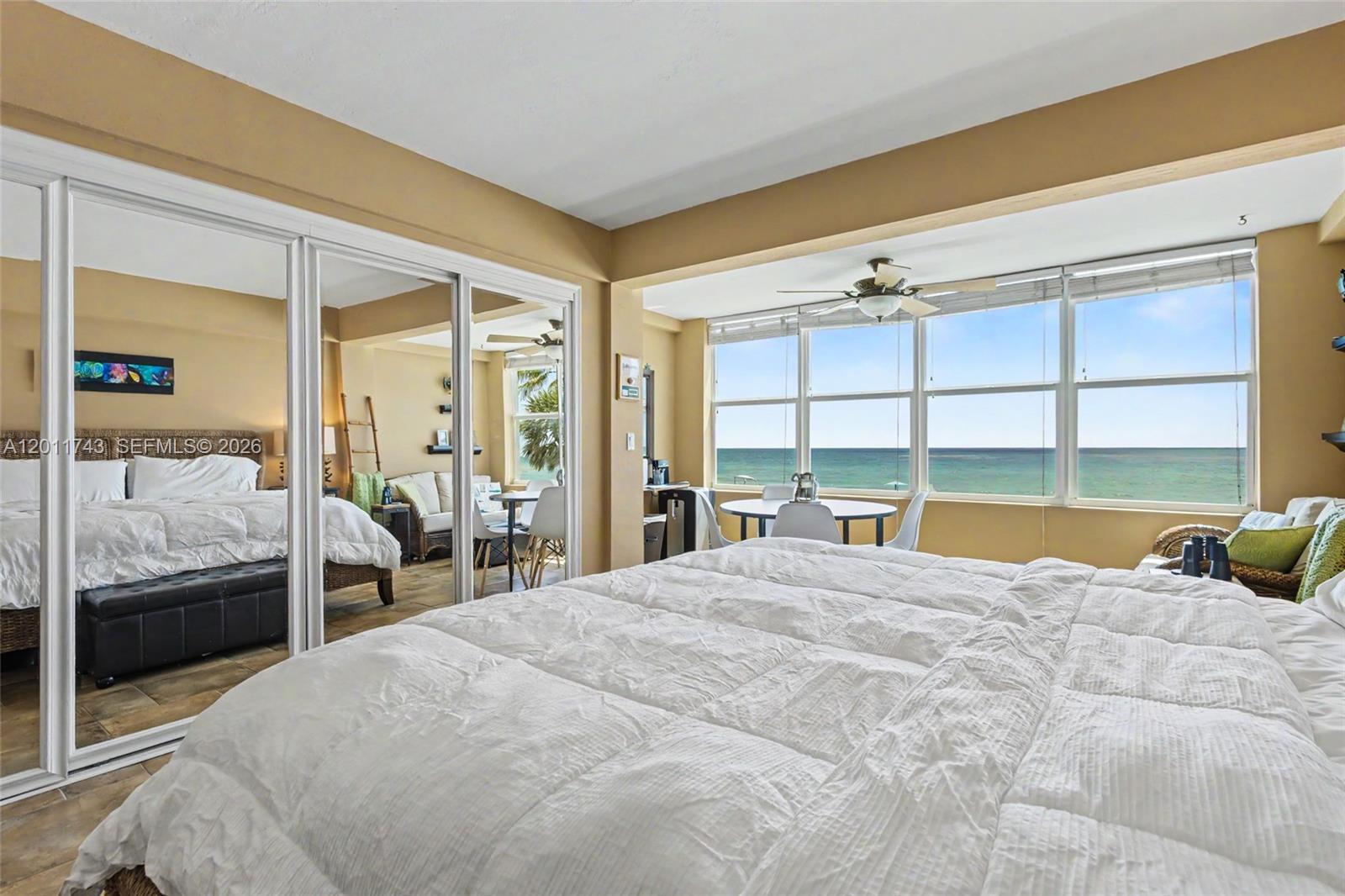 1801 South Surf Road, Unit 2G Hollywood, FL 33019 - Photo 25 of 32 a large bedroom with a large bed and a large window
