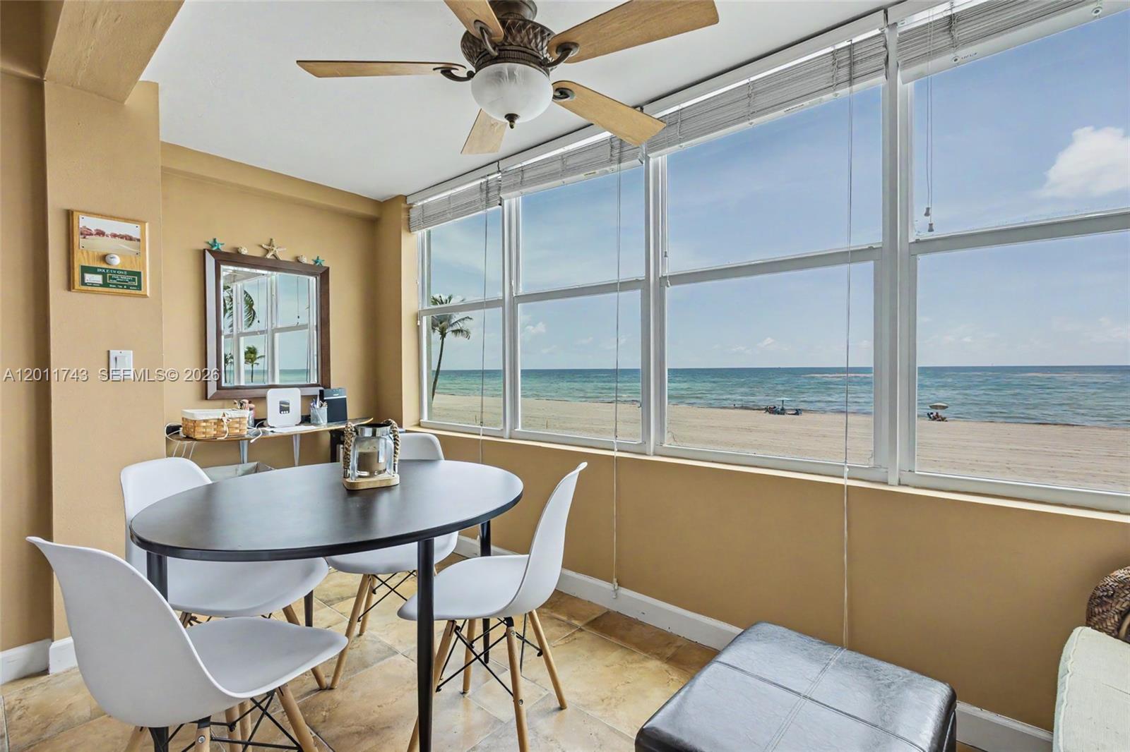 1801 South Surf Road, Unit 2G Hollywood, FL 33019 - Photo 28 of 32 a dining room with furniture and window