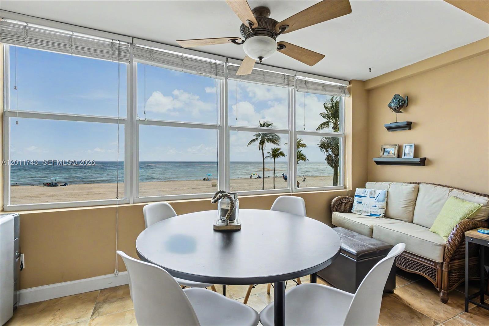 1801 South Surf Road, Unit 2G Hollywood, FL 33019 - Photo 29 of 32 a view of a dining room with furniture window and outside view