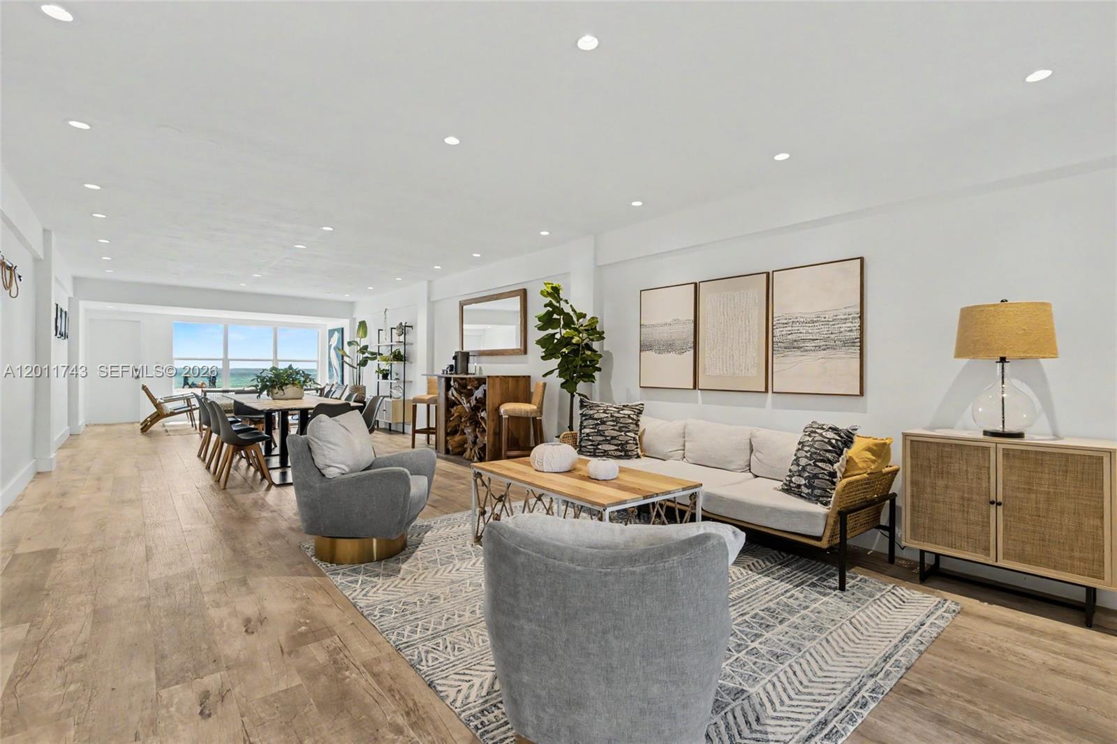 1801 South Surf Road, Unit 2G Hollywood, FL 33019 - Photo 9 of 32 a living room with furniture and a wooden floor