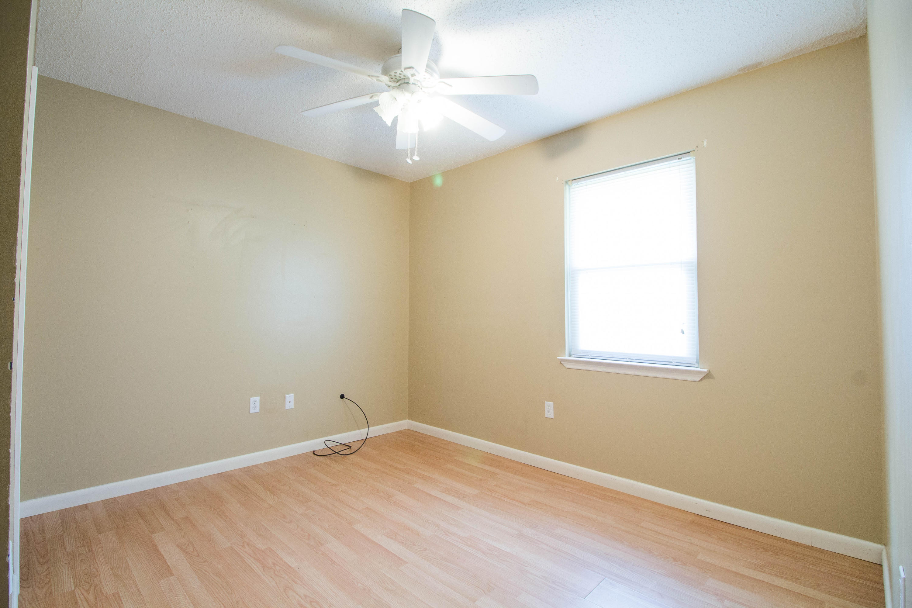 6163 Old Hickory Road Crestview, FL 32539 - Photo 14 of 21 an empty room with a window