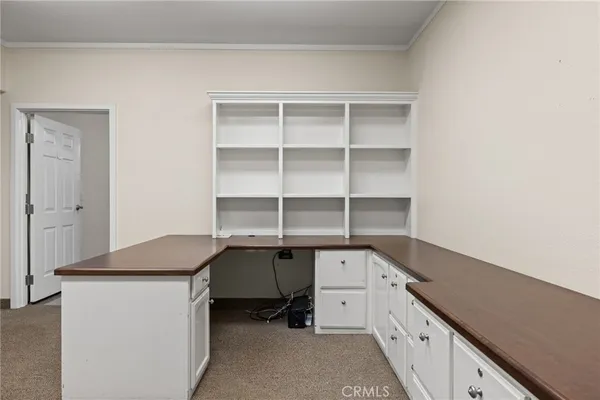 a room with a desk and chair