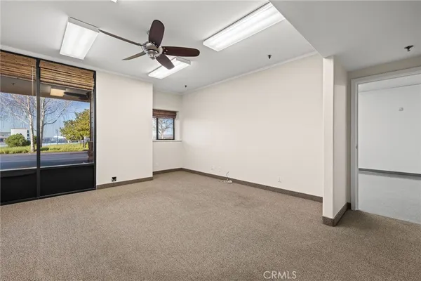 an empty room with windows