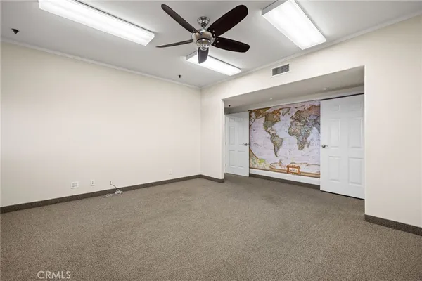 a view of a livingroom with wooden floor