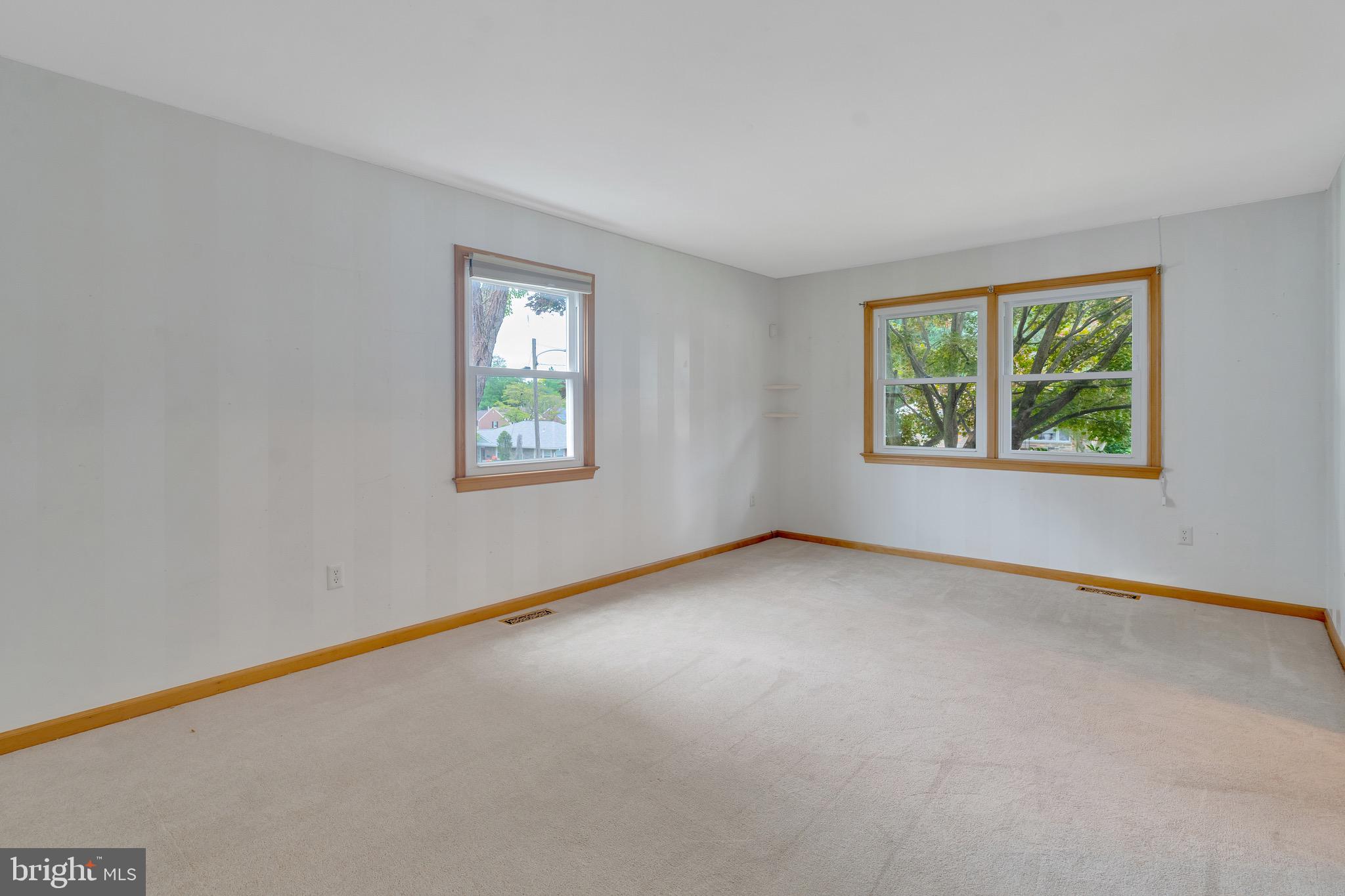 2317 Poplar Road, Unit 24 Havertown, PA 19083 - Photo 18 of 42 an empty room with windows