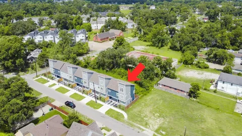 an aerial view of residential house with outdoor space and street view