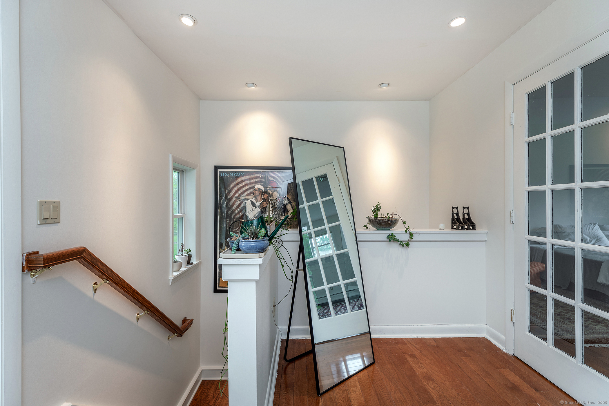 17 Rhynus Road Sharon, CT 06069 - Photo 15 of 30 a view of a hallway with workspace and wooden floor