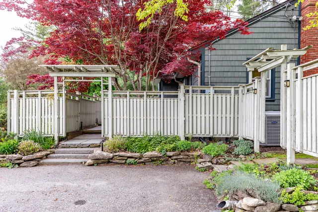 a front view of a house having yard