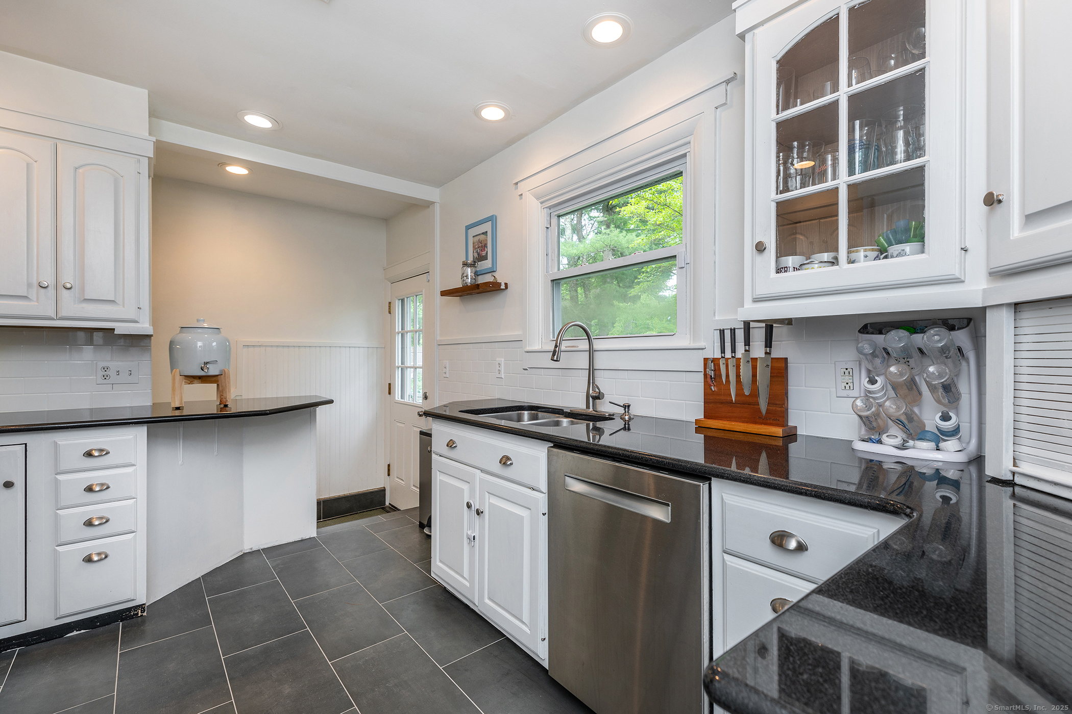 17 Rhynus Road Sharon, CT 06069 - Photo 8 of 30 a kitchen with stainless steel appliances granite countertop a stove and a sink