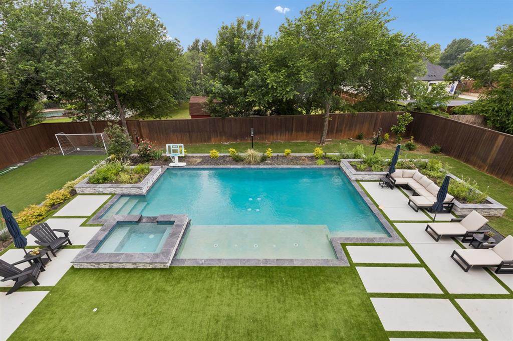 6700 Herbert Road Colleyville, TX 76034 - Photo 27 of 32 a view of a swimming pool with a patio